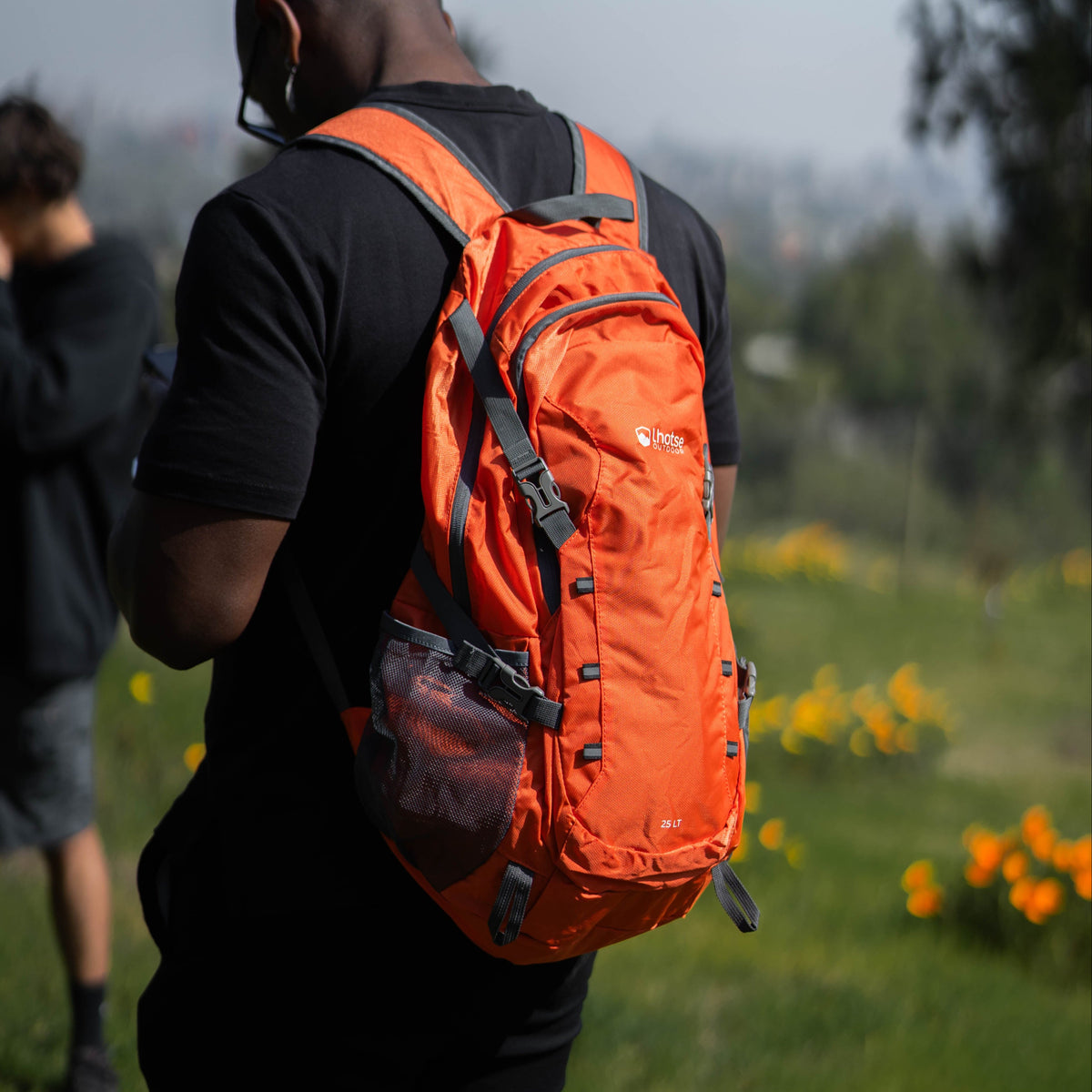 Mochila Outdoor Lhotse Plegable 25Lt Negra Naranjo